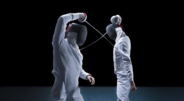 Two fencers are fighting in a tournament. The concept of fencing.