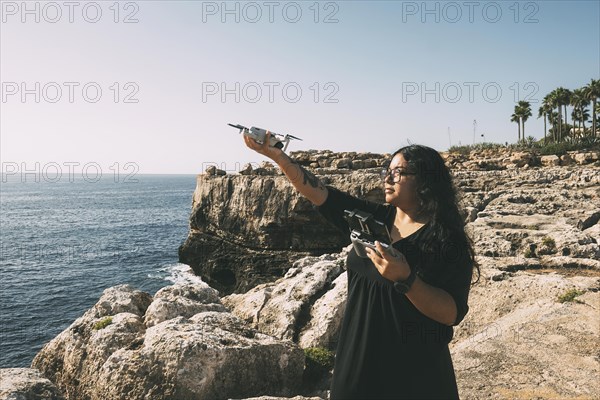 Happy woman with drone