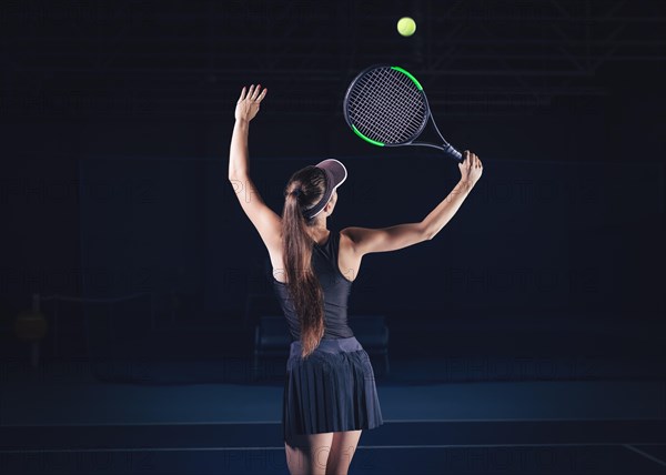 Portrait of a beautiful tennis player during a match. Sports concept.