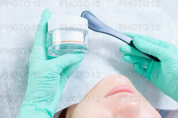 Image of a jar with a mask for facial skin care. Concept for beauty salons.