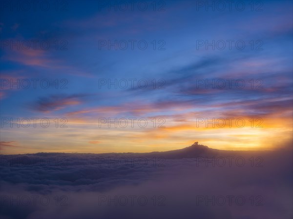 Dawn over the sea of clouds