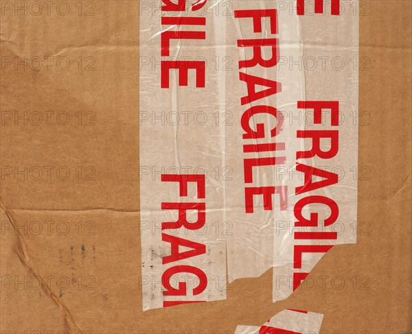 Fragile on cardboard packet