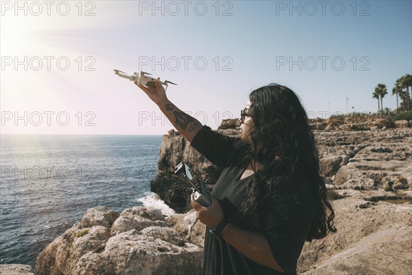 Happy woman with drone