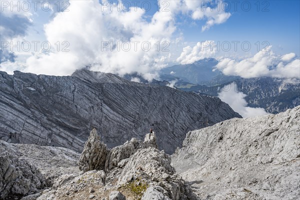 Mountaineer on rocky peak