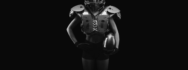 NO name portrait of a woman in shoulders pads. American football. Sports concept.