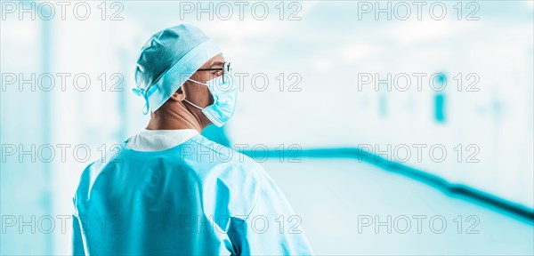 Portrait of a doctor in a hospital. Back view. Medicine concept.