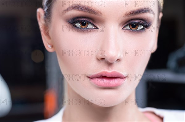 Close-up portrait of a girl. The concept of the beauty industry