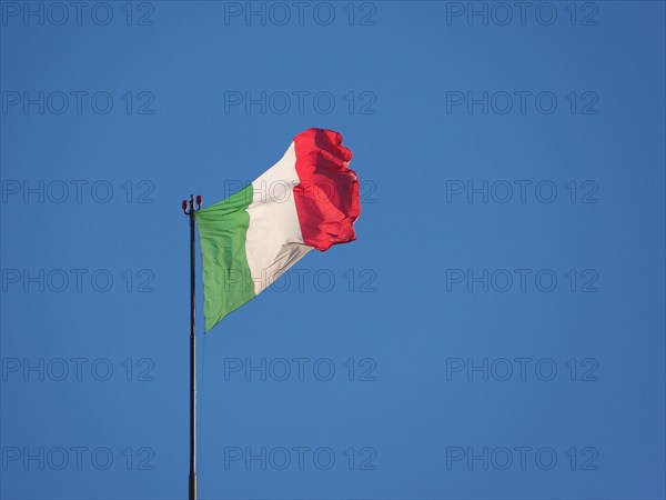 Italian Flag of Italy over blue sky