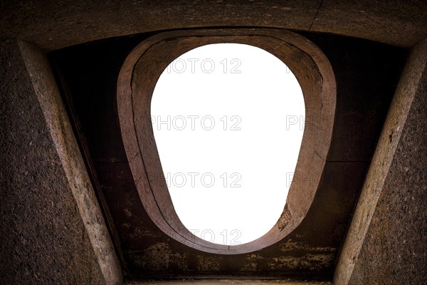Image of an oval window in the fortress of Fort Constantine