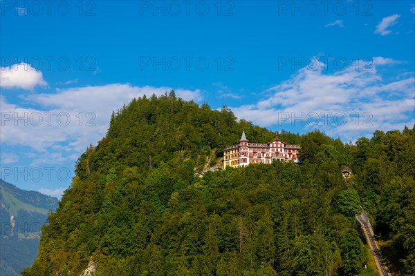 The Historical Grandhotel Giessbach on the Mountain Side in Bernese Oberland