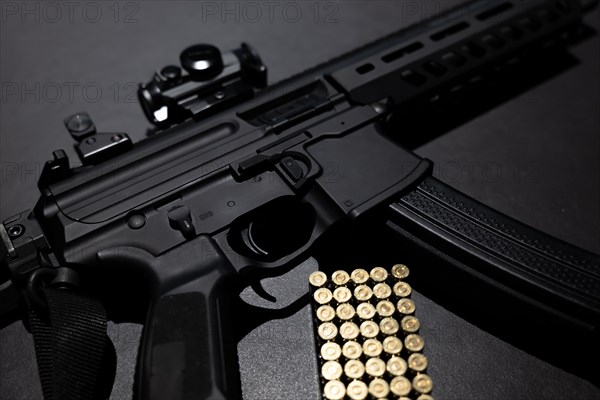 Modern Elegant Assault Rifle and Bullet on Grey Background in Switzerland