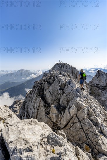 Mountaineer on rocky mountain path