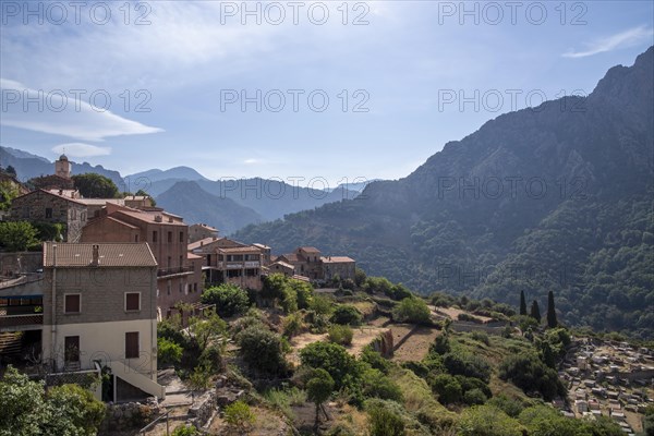 The village of Ota with mountain landscape in the background