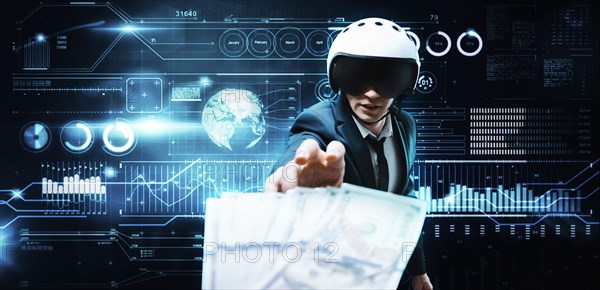 Portrait of a businessman in a suit and aviator helmet. He is trying to reach a pack of hundred-dollar bills. Business concept.