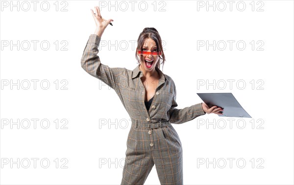 Woman interviewer stands in the studio on a white background with a tablet in her hand. Job interview concept. Recruiting and personnel selection.