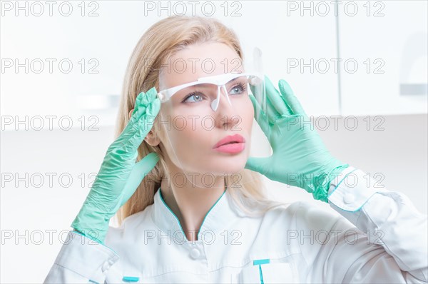 Portrait of a girl in a protective mask. Concept of cosmetology