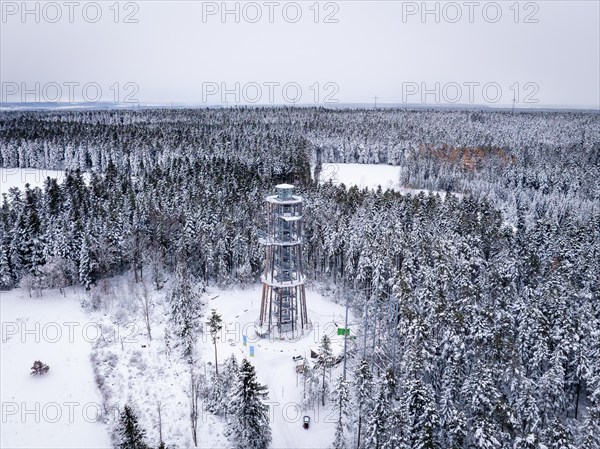 Observation tower protruding from a dense