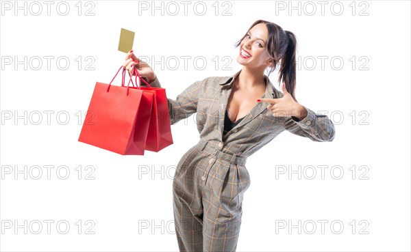 Sexy girl posing with a discount card and red bags. Concept Shopping on Black Friday. White background.