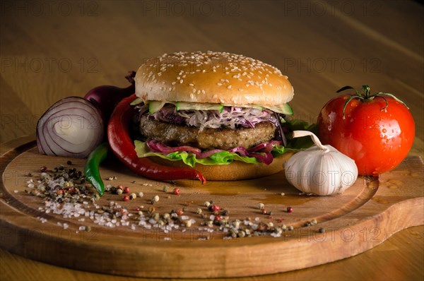 Delicious cheeseburger with fried beef chops