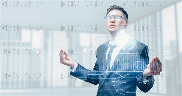 Portrait of a meditating man in a business suit. Double exposure. Business and finance. Development concept.