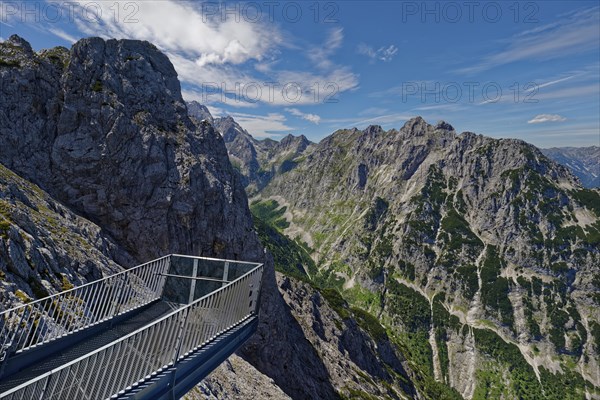 Viewing platform in the mountains with a view of the surrounding rock formations
