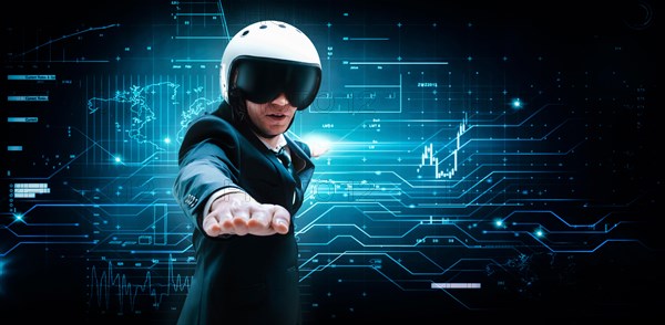 Portrait of a man in a suit and helmet. He shows that he is flying against the background of a hologram of market trading. Business concept. Stock market. Brokers and traders.