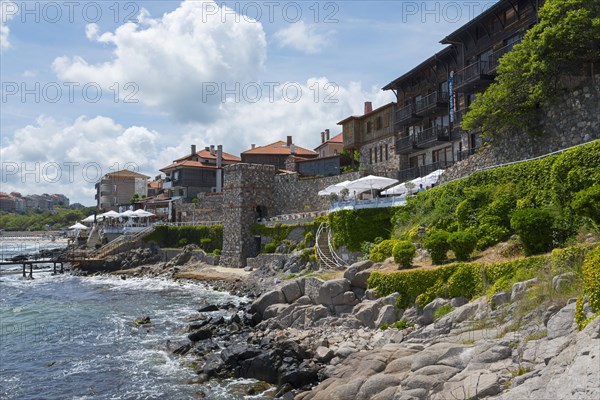 View of a picturesque coastal town with traditional architecture