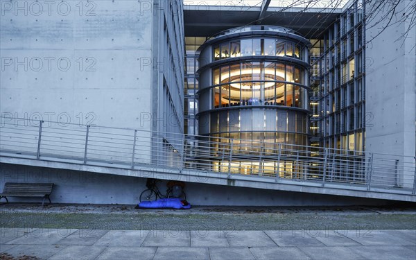 A homeless man sleeps in a sleeping bag at the Paul Loebe Haus. Aid organisations register an increase in homeless people