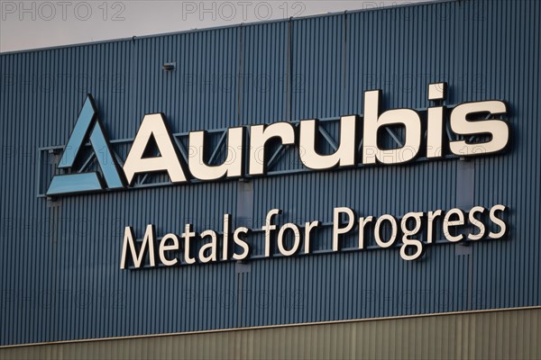 Logo and lettering Aurubis Metal for Progress on a factory building at the Aurubis AG plant