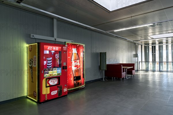 Vending machines for Langnese ice cream and Coca-Cola soft drinks in a waiting room