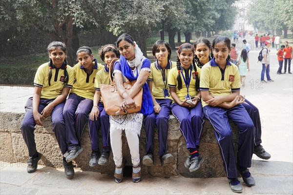 Indian schoolgirls with teacher visiting the Humayun Mausoleum