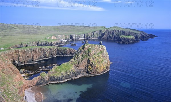 Spectacular coastline with sea cliffs and stacks at Westerwick