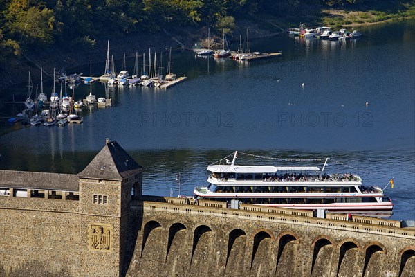 Elevated view of the Eder dam with the dam wall and the excursion boat Edersee Star on the Edersee
