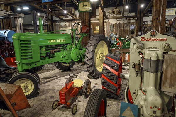 John Deere and Huerlimann tractors