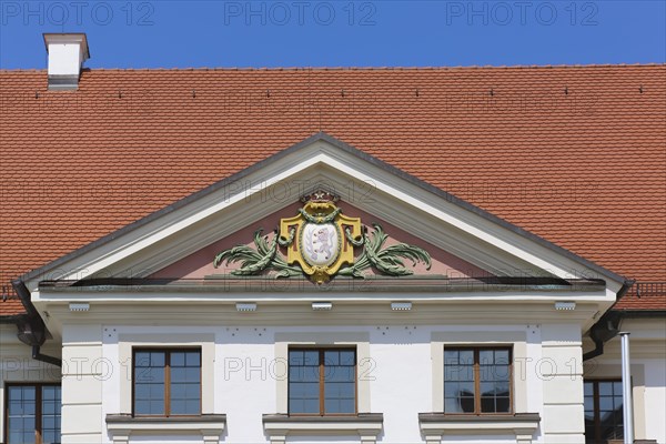 Coat of arms in the triangular gable