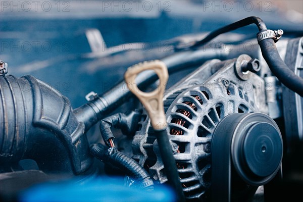 Generator in a car near an internal combustion engine