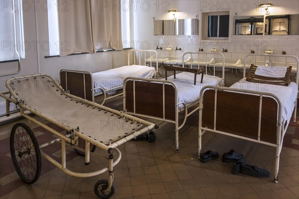 Hospital beds in the Dr Guislain Museum about the history of psychiatry in the former Guislain Hospice