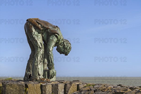 Monument to the stone setter on the Afsluitdijk between the Wadden Sea and the Ijsselmeer