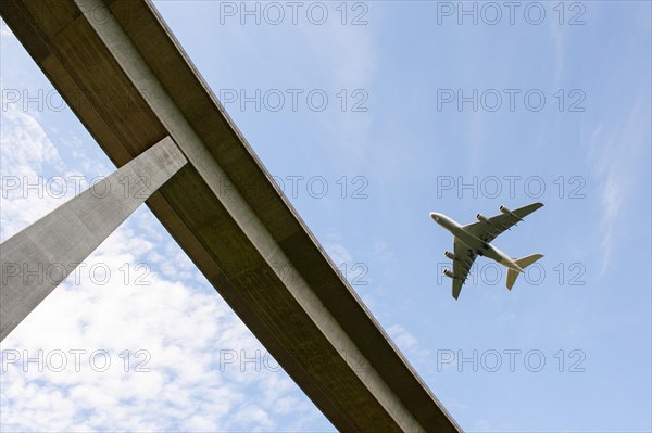 Airbus A 380-800 flies over a bridge near Stuttgart
