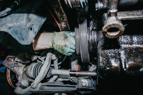 Car engine alternator belt replacement