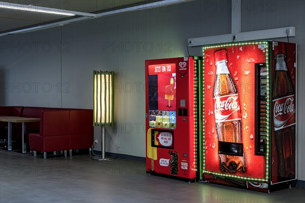 Vending machines for Langnese ice cream and Coca-Cola soft drinks in a waiting room