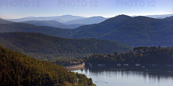 Elevated view of the Edertalsperre dam with the dam wall and a wide view of the Kellerwald-Edersee National Park