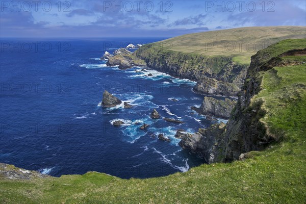 Spectacular coastline with sea cliffs and stacks