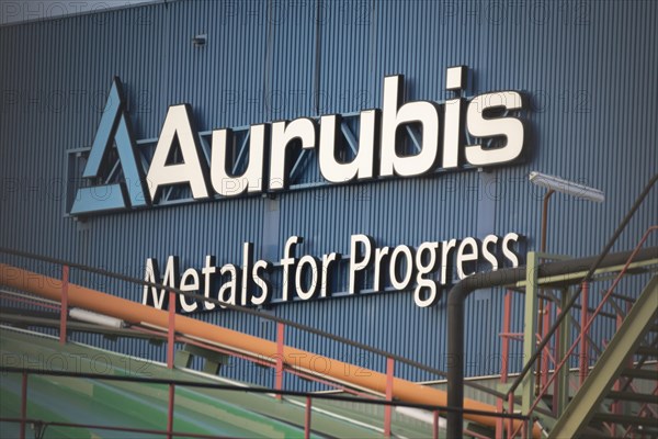 Logo and lettering Aurubis Metal for Progress on a factory building at the Aurubis AG plant