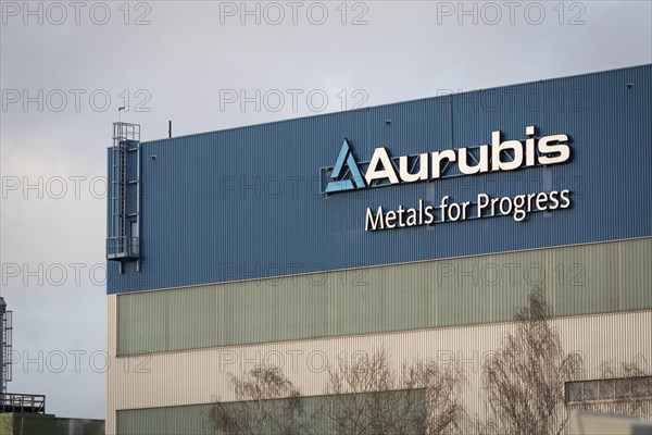 Logo and lettering Aurubis Metal for Progress on a factory building at the Aurubis AG plant