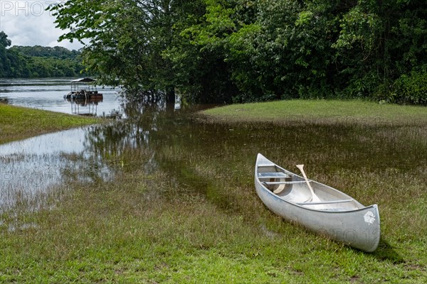 Canadian kayak on the Essequibo river near the Iwokrama River Lodge along the Linden-Lethem road