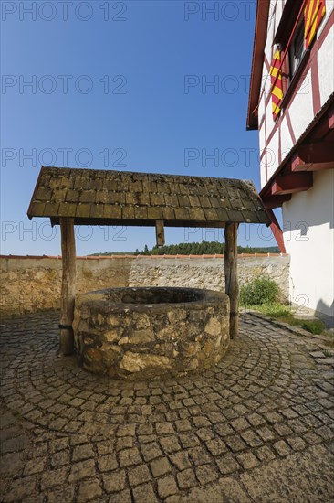 Fountain next to the hiking home of the Swabian Alb Association at Derneck Castle