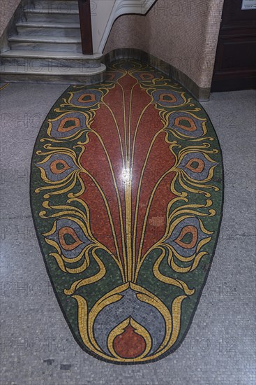 Floor mosaic in a staircase built in Art Nouveau style