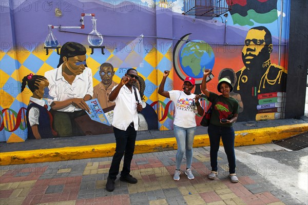 Guides in front of Marcus Garvey