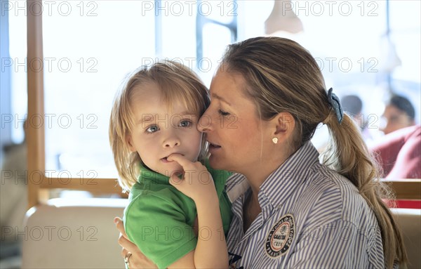 Mother comforts boy
